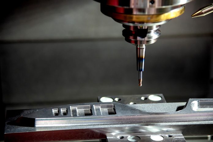 The CNC milling machine cutting the injection mold part by solid ball end mill tool.