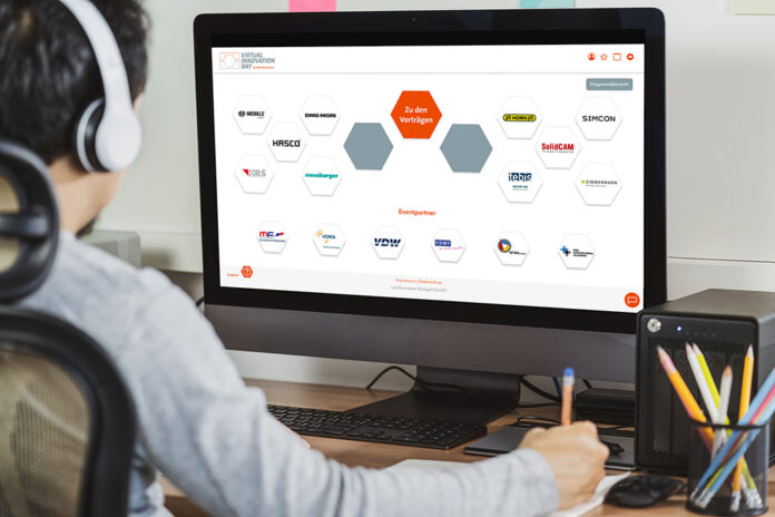 Rear view of Asian businessman working and online meeting via vi